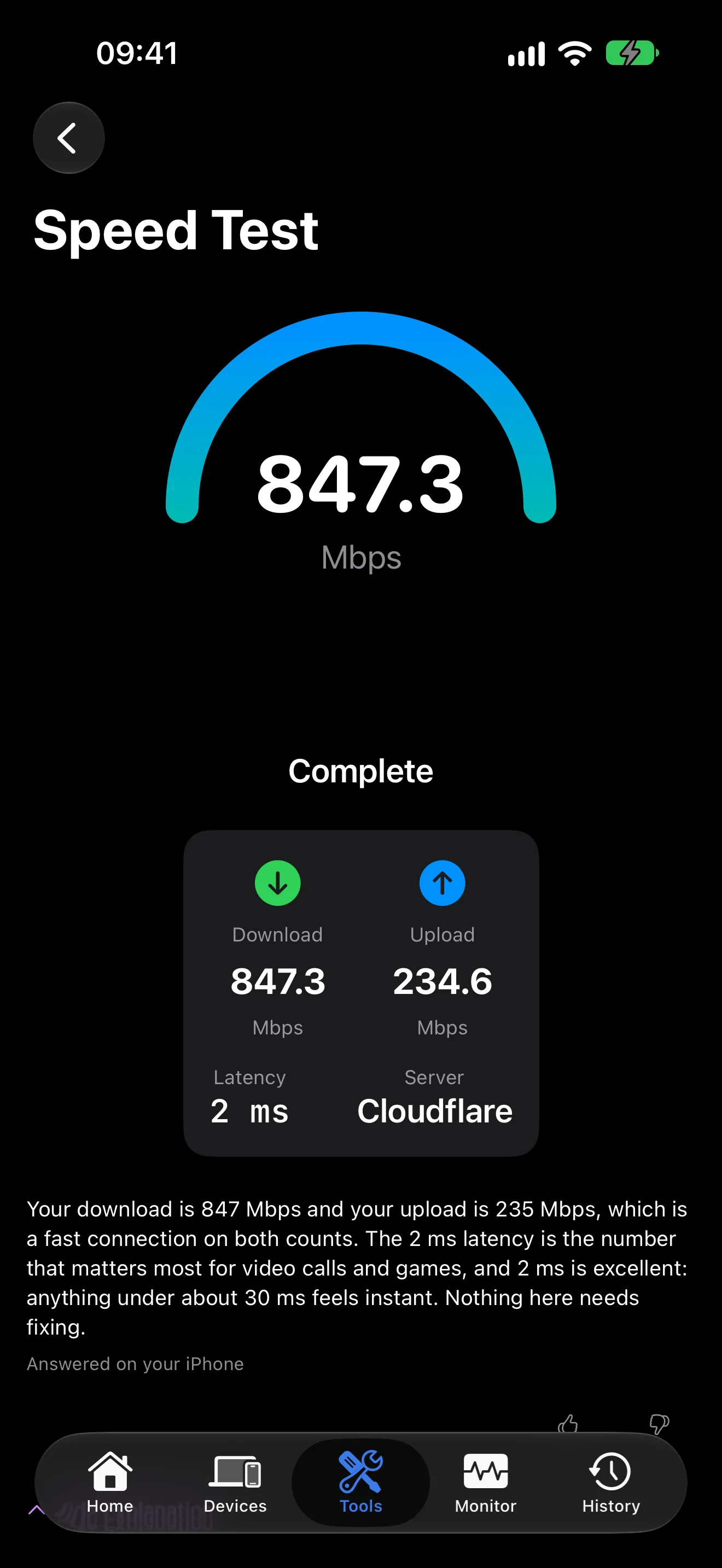 PingKit internet speed test result with download and upload speeds, latency and a plain-language explanation